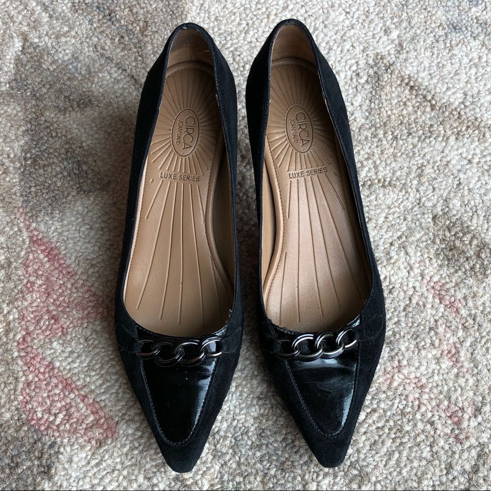 Classic black suede and patent leather pumps